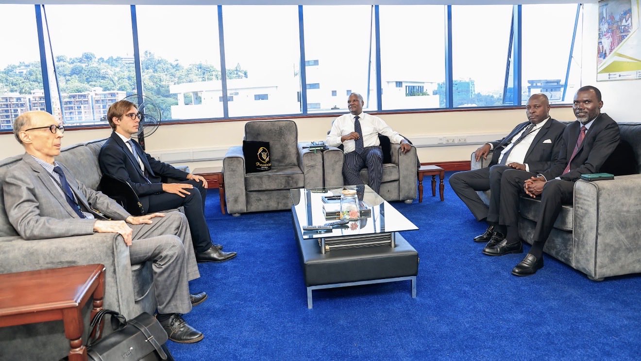 H.E. Vladlen Semivolos, Russian Ambassador to Uganda; a representative from the French Embassy; members of the Presidential CEO Forum Board, including Mathias Katamba, who represented the Board Chair at the center; Douglas Opio; and a representative from the Ministry of Foreign Affairs (Uganda) positioned on the left.